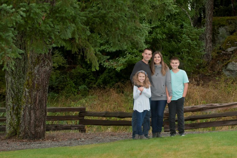 Martin Bisset with wife Angie and their two children